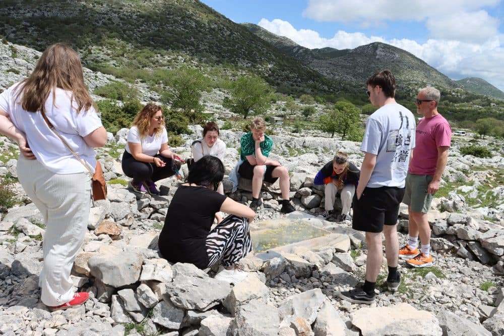 Group of students of a guided walk through the mountains