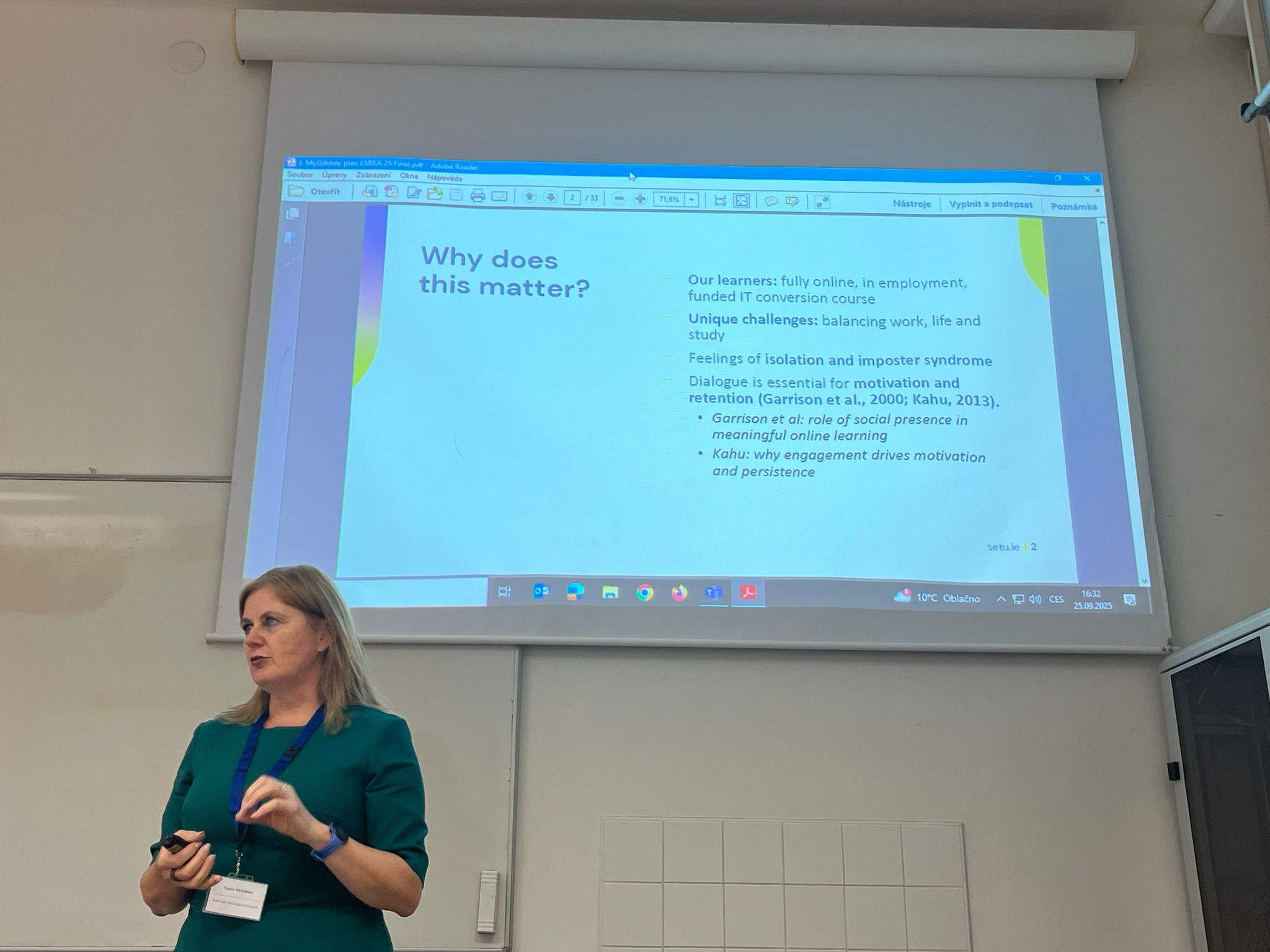 Female presenting in front of a screen