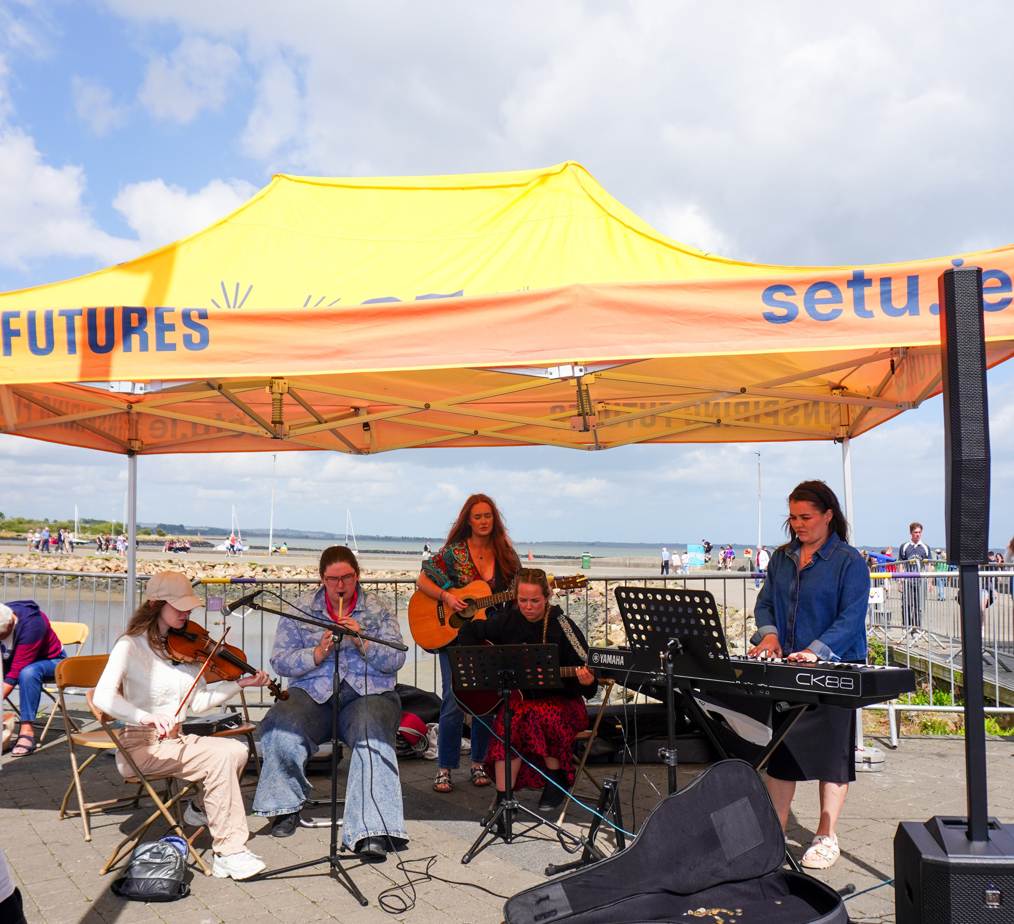 Pictured are Students from the Bachelor of Arts (Honours) in Music at the Fleadh cheoil na hÉireann, performing pop, folk, and traditional Irish songs for the crowd.