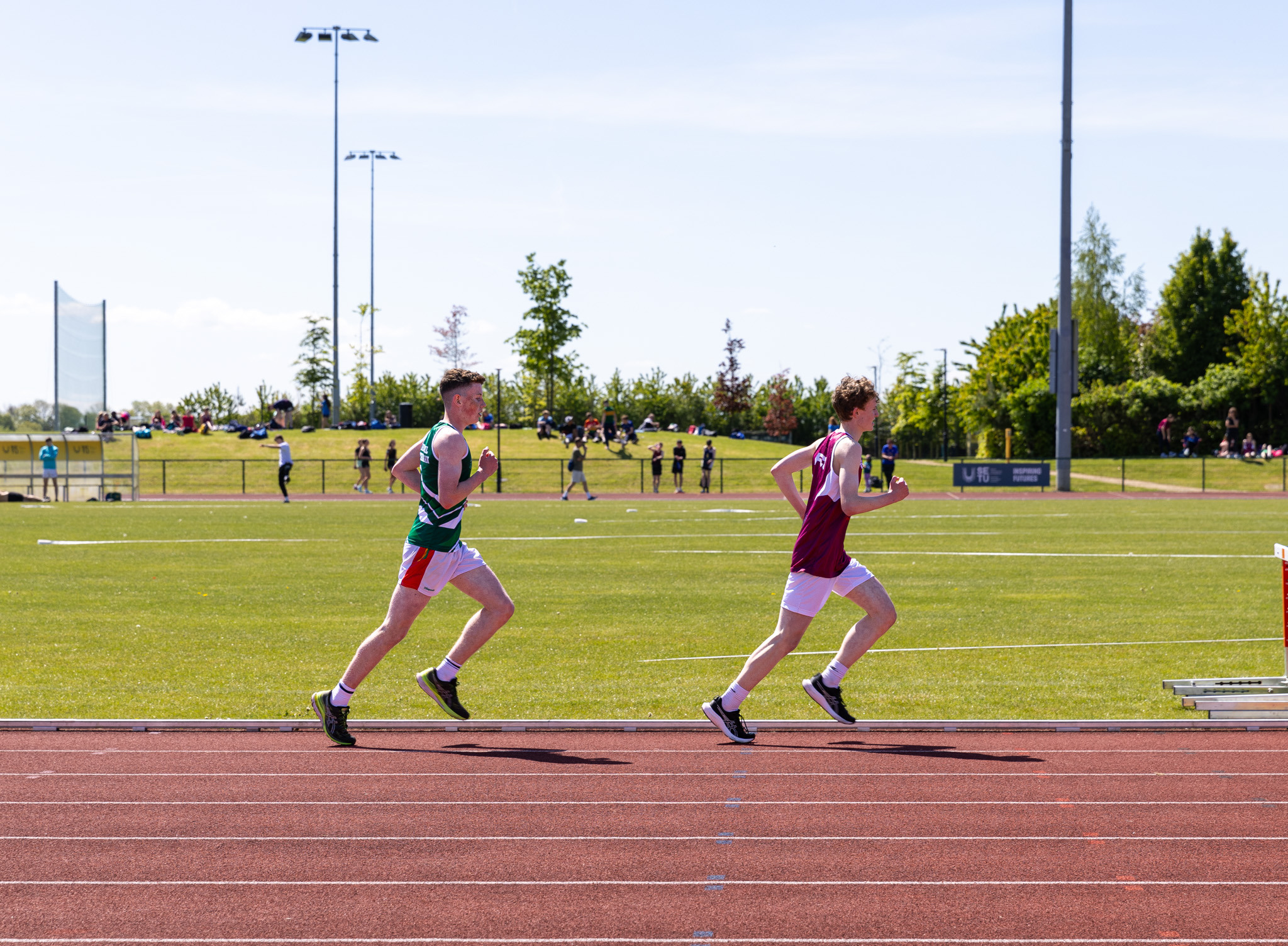 Two athletes competing in long distance running final
