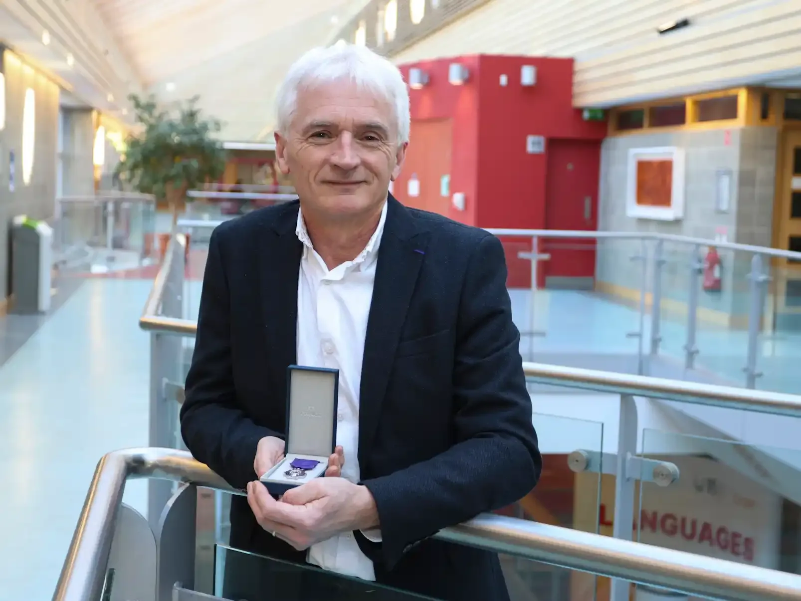 Dr Paul Ryan, lecturer at SETU, pictured with France's highest academic decoration, the rank of Chevalier de l’Ordre des Palmes académiques.