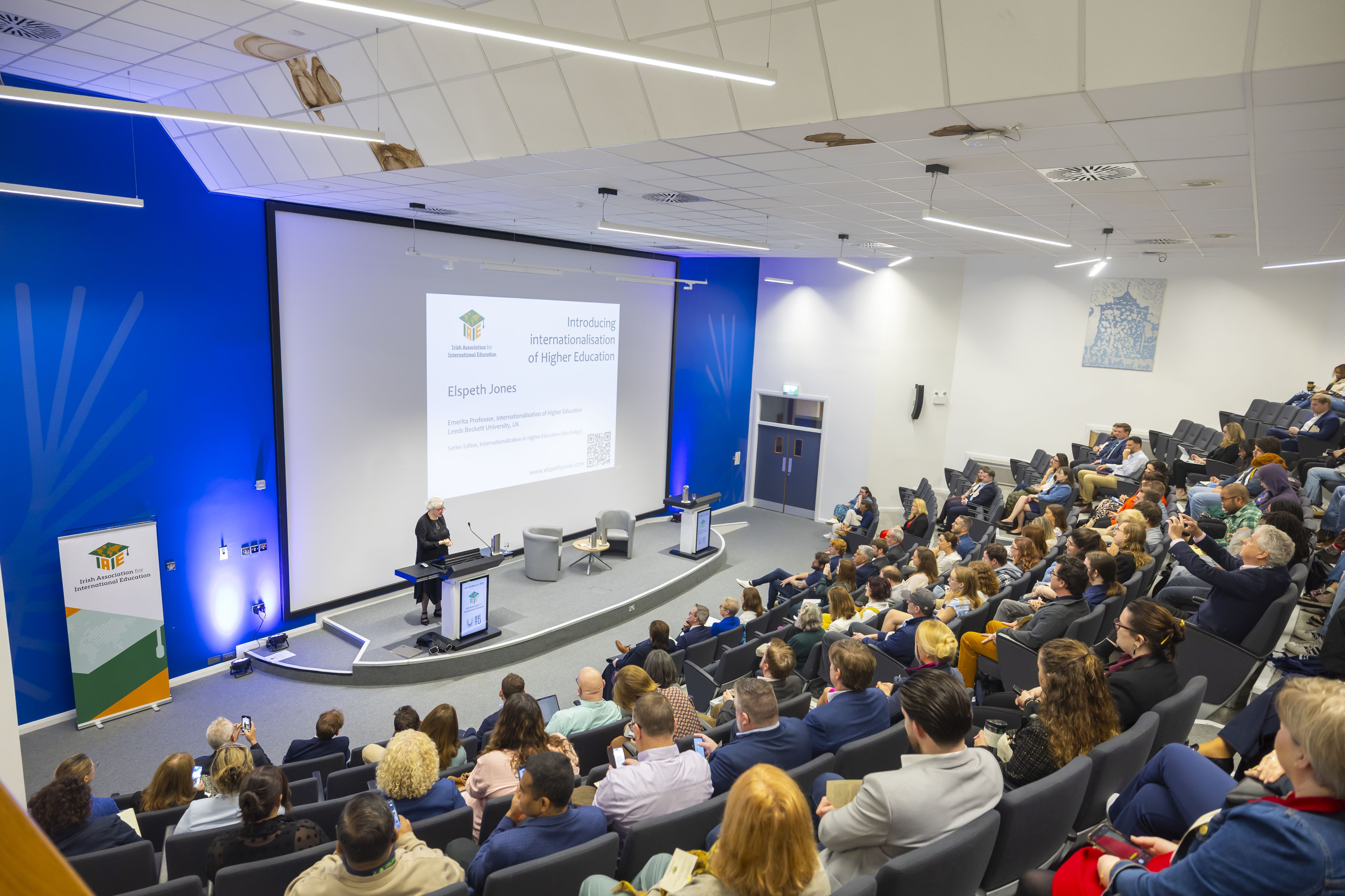 Pictured is Prof. Elspeth Jones giving a speech at the conference 