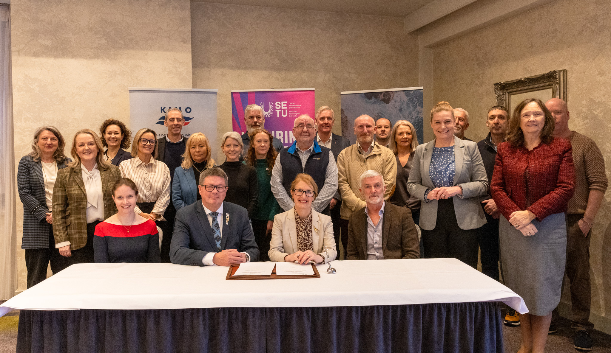 Attendees and representatives from partner organisations of the southeast pictured with Preben Friis-Hauge, President of KIMO International and Prof. Veronica Campbell, President of SETU.