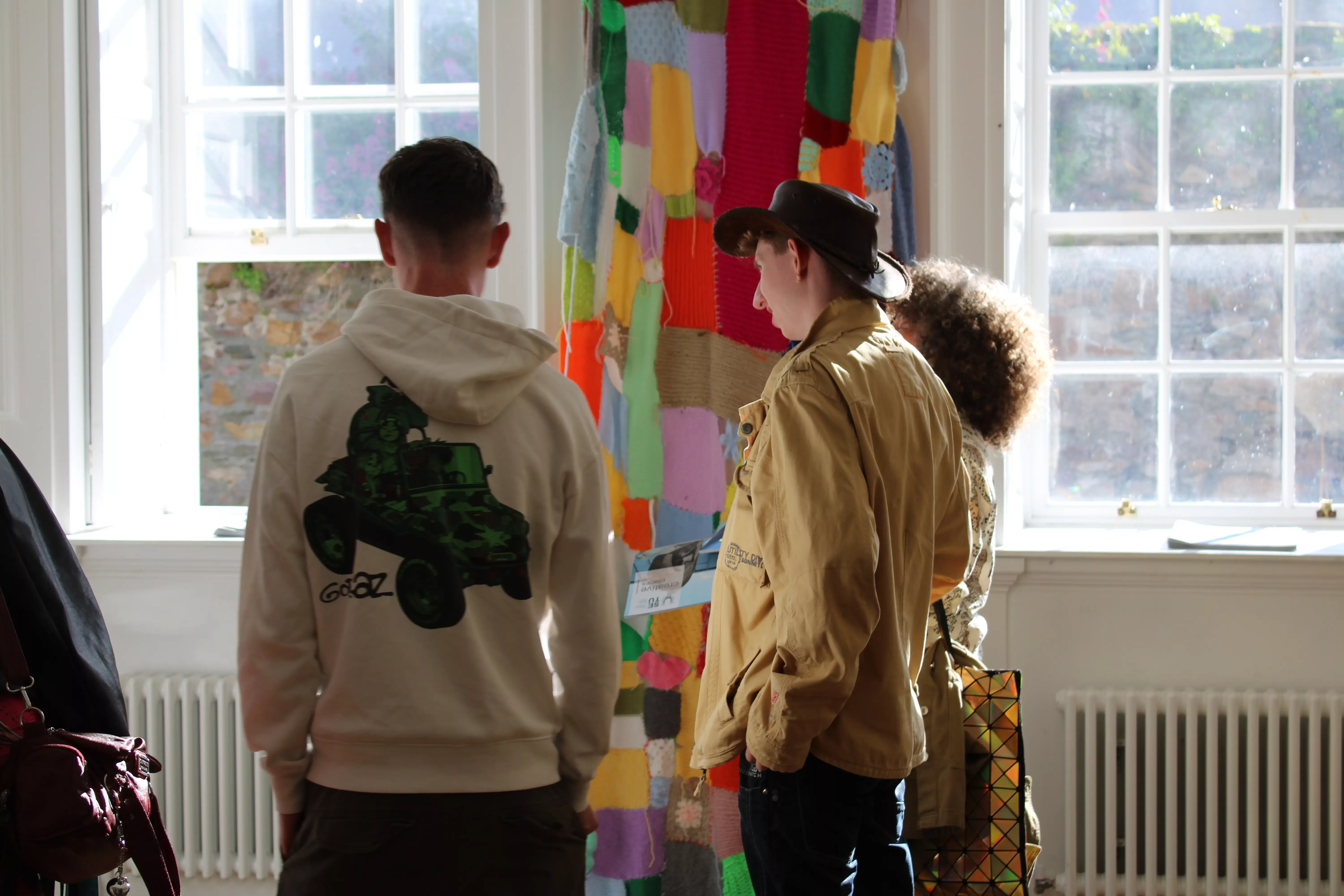 Picture of people looking at the Arts.