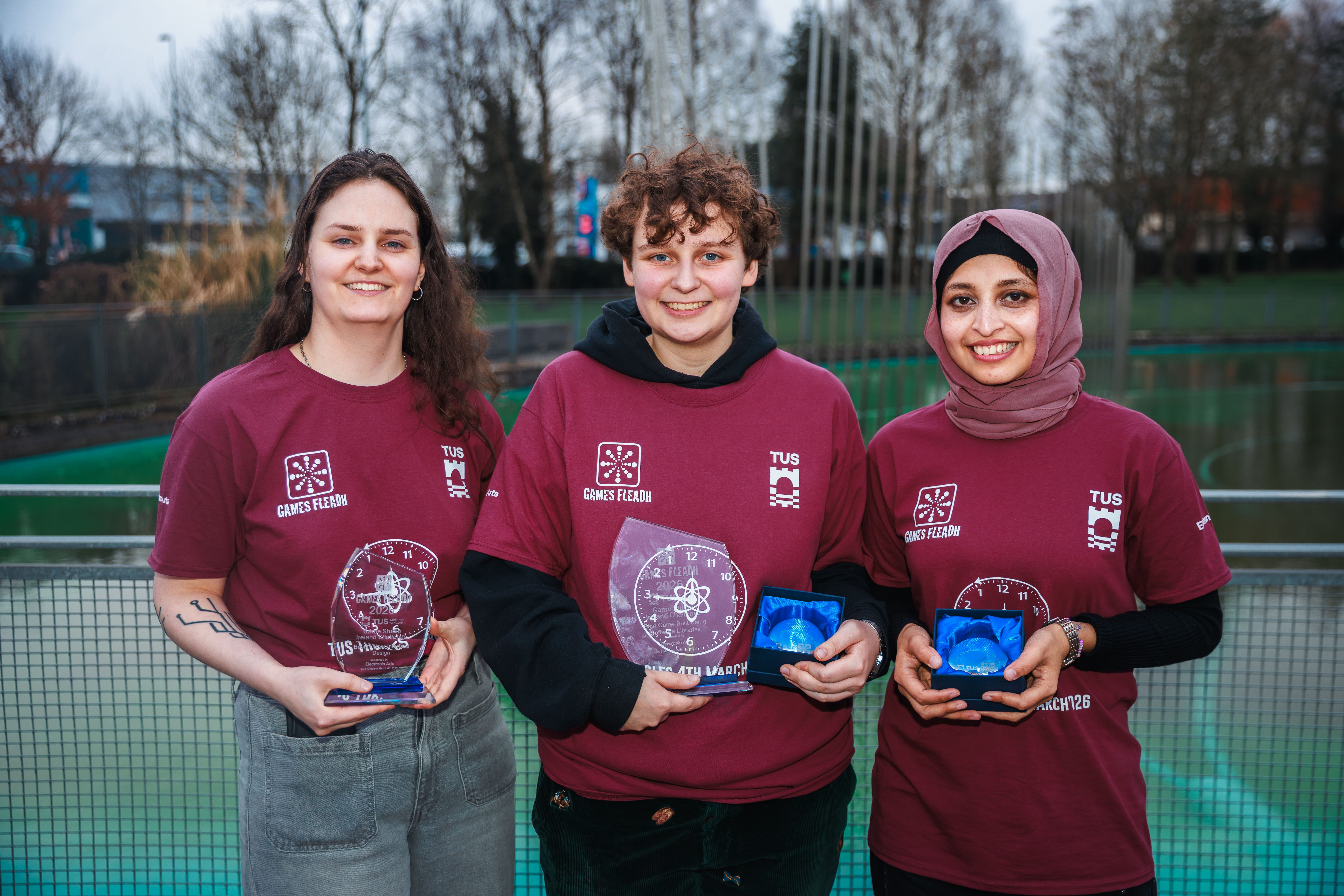 Emma Brennan (Fishyics), Award Best in User Interface Design; Marie-Elise Ghijsen (OOZ3), Best Game; and Ak Bitu (OOZ3) Best Game.