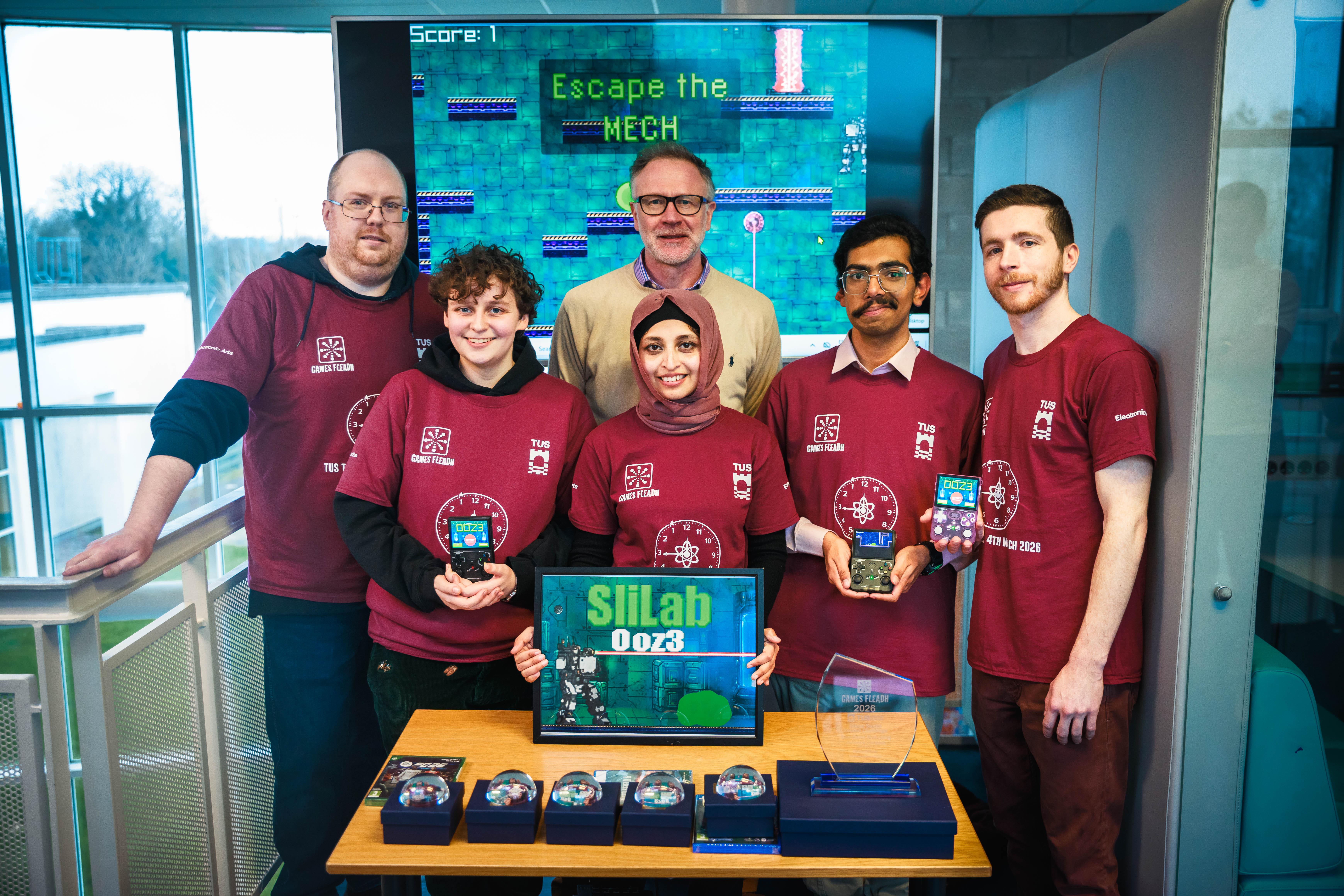 OOZ3 Overall Winner, Best Game. Pictured with Nigel Whyte, HOD Computing with (L-R) Padraig O'Reilly; Marie-Elise Ghijsen; Ak Bitu; Kevin Michael (Team Captain); and Daemon Medeiros.