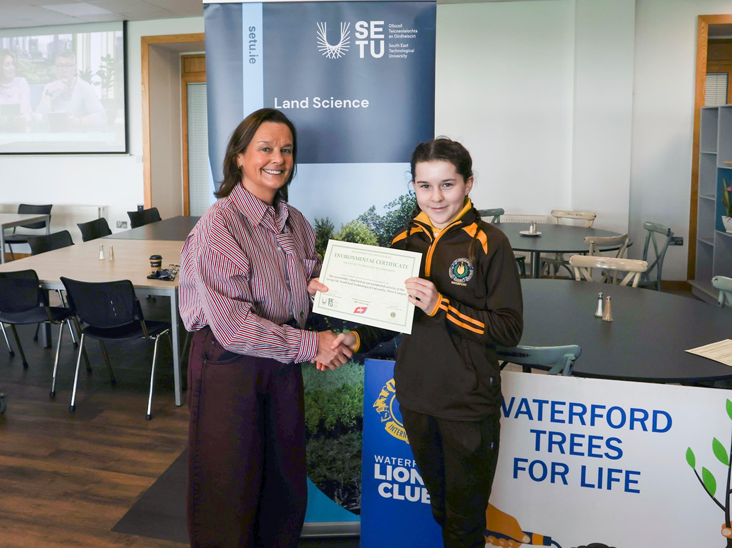 student getting environment certificate