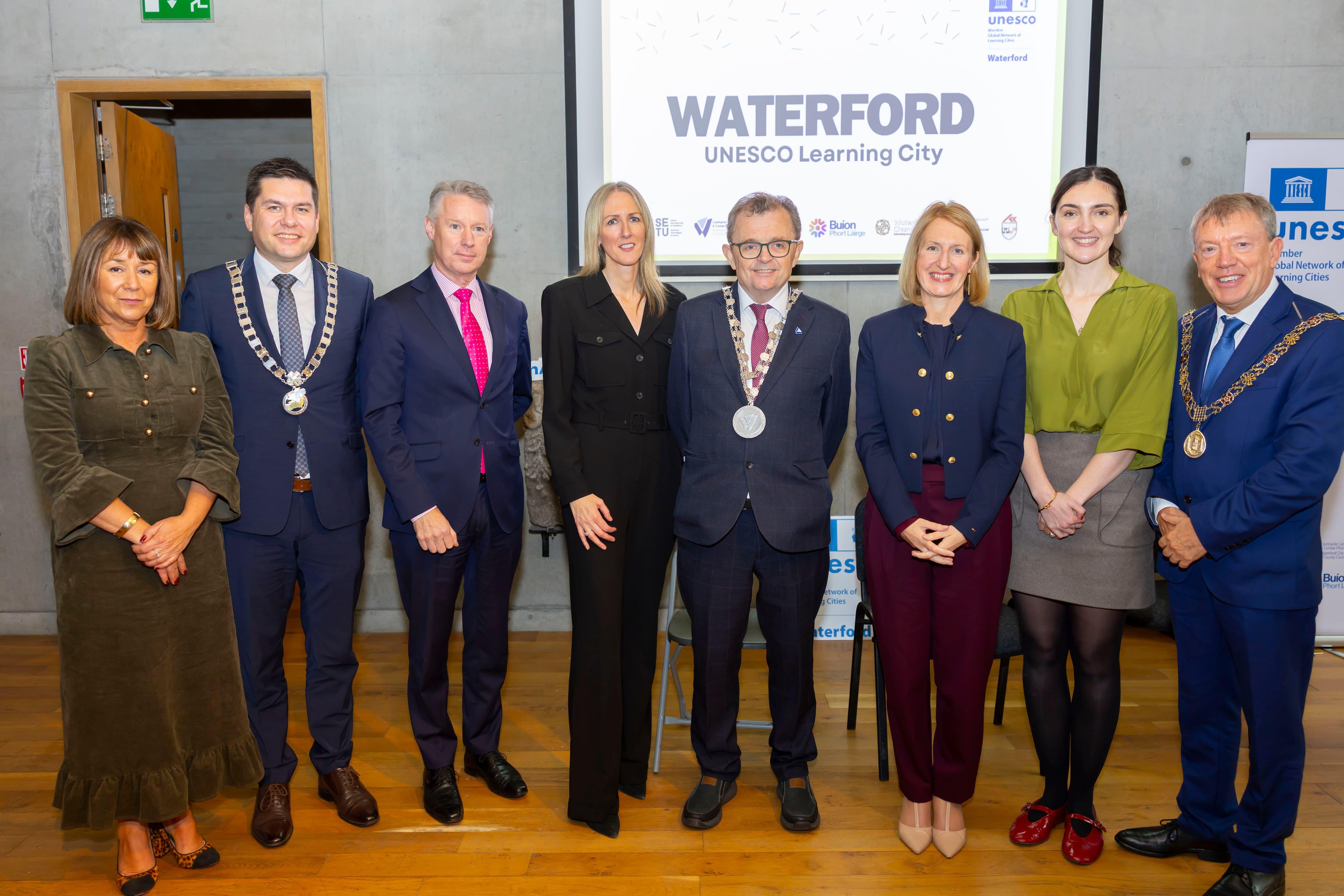  Dr Helen Murphy, Head of Faculty of Education and Lifelong Learning; Cllr. Andrew McGuinness, Cathaoirleach of Southern Regional Assembly; Michael Quinn, Waterford City and County Council; Dr Karina Daly, Chief Executive of WWETB; Cllr. Seamus Ryan, Mayor of Waterford City and County; Prof. Veronica Campbell, President of SETU. Laura Power, Learning City Project Manager, SETU; and Cllr. Tony Fitzgerald, Deputy Lord Mayor of Cork. At the celebration of Waterford joining the network of Irish Learning cities 