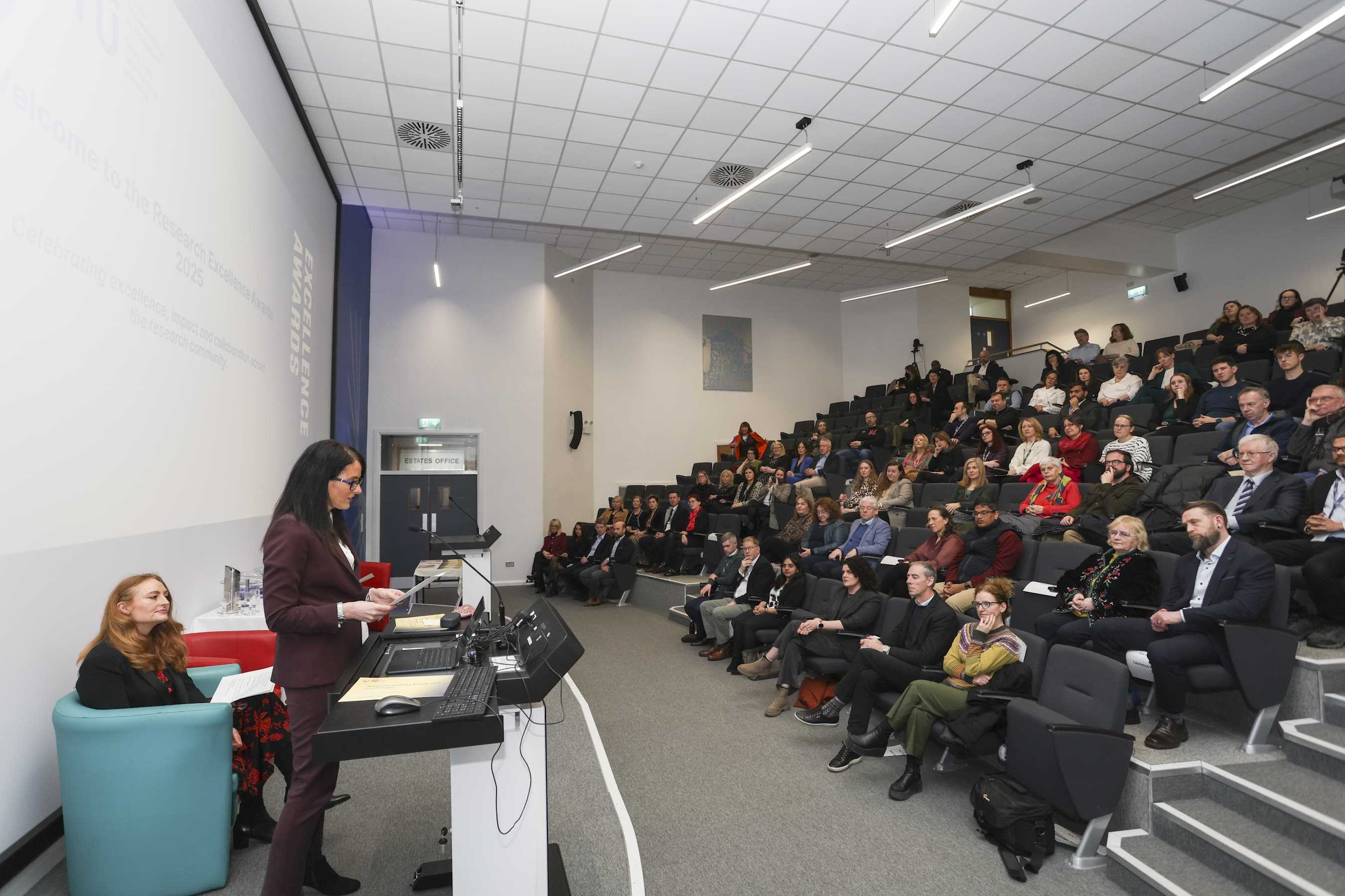 Professor Marie Claire Van Hout address a packed Auditorium at the Research Excellence Awards 2025