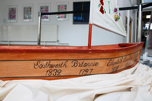 The boat made in the Carpentry shop by the staff and men of Arbour Hill Prison, pictured at the Roses from the Heart exhibition at SETU’s Carlow campus.