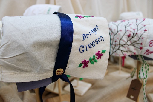 The bonnet created for Bridget Gleeson, a native of Waterford City, who was transported on the 30 November 1833 on board the ship Andromeda II to New South Wales. Pictured at the Roses from the Heart Exhibition at SETU’s Carlow campus.