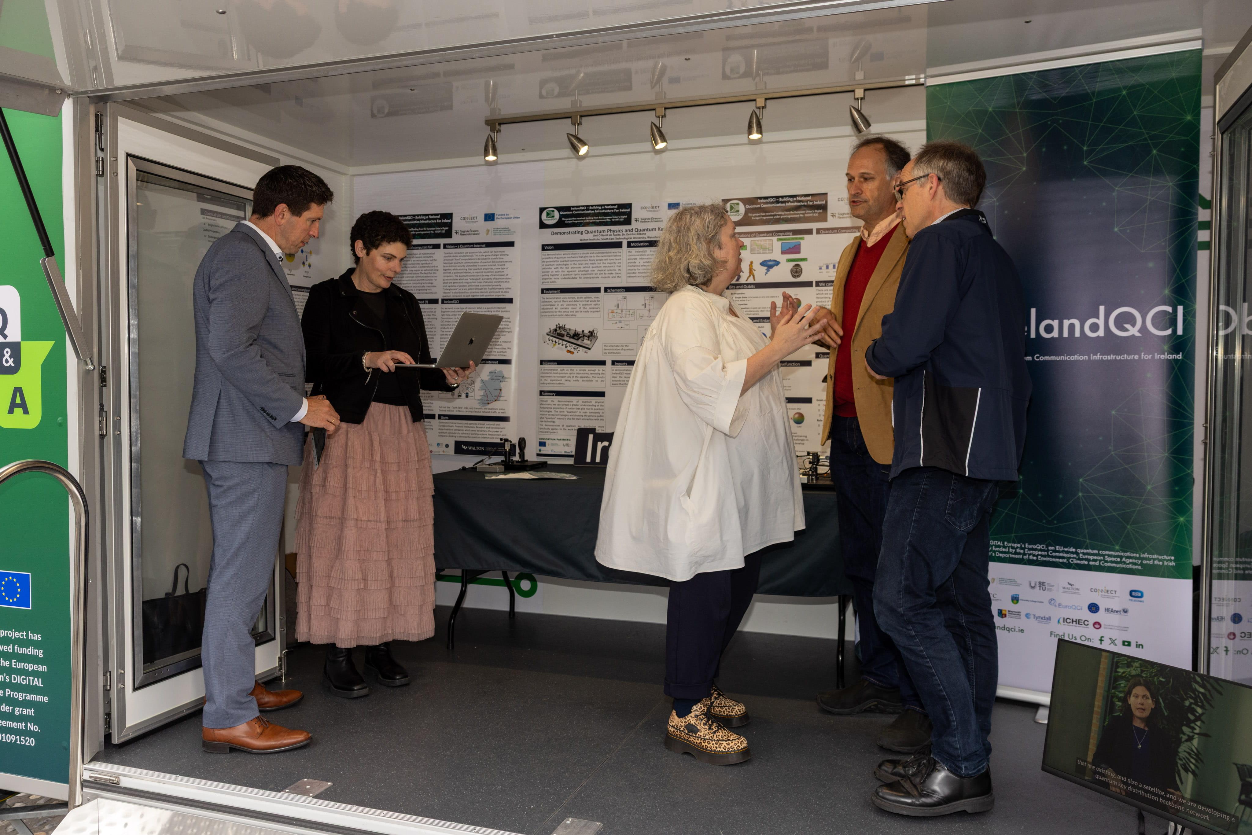 Representatives from IrelandQCI exploring the inside of the IrelandQCI Q&A Trailer